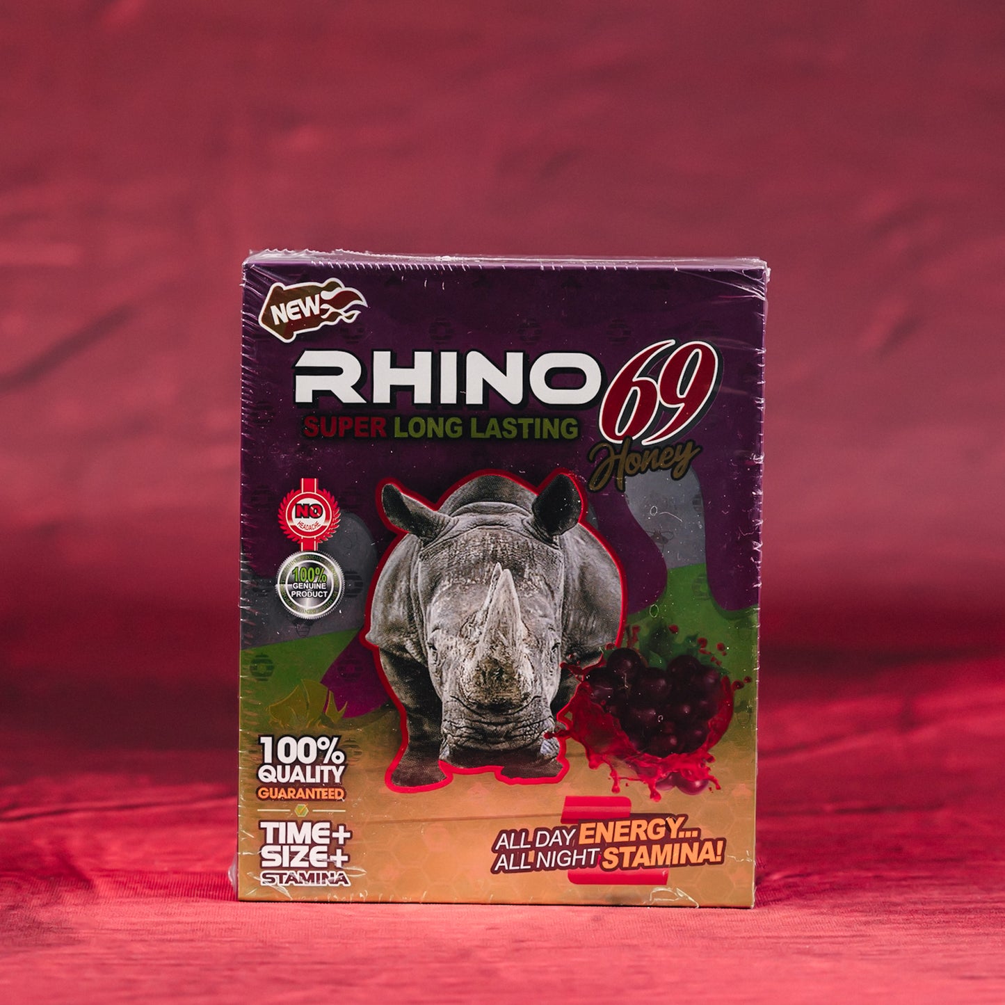 Box of grape flavored Rhino 69 honey with a rhino on a red background. Honey pack for men near me